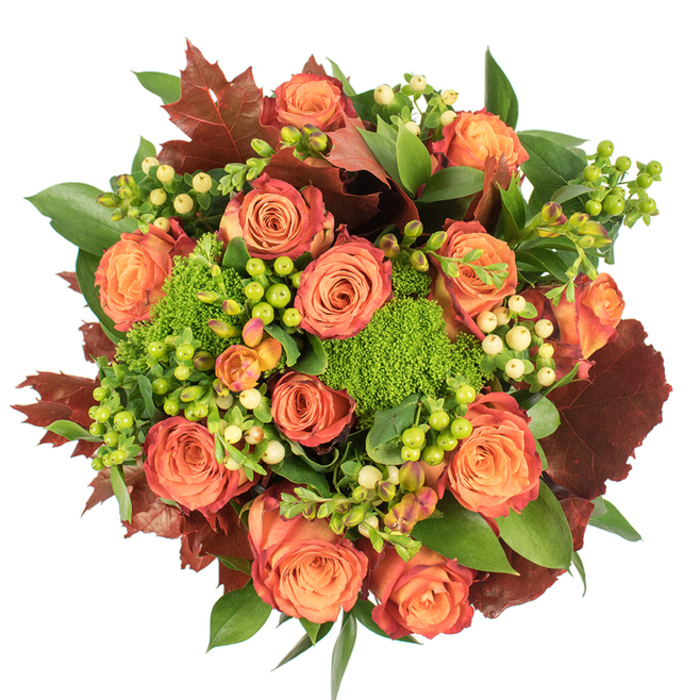 Presented in a tight, circular format and photographed from above on a stark white ground, this luxurious autumn bouquet reads as a study in warm tones and layered surfaces. A multitude of large, open roses dominates the centre, their petals shifting from a gentle warm orange at the heart to coral and finally to russet-tinged outer edges, creating a soft gradient reminiscent of fall foliage. Interspersed with the roses are vivid green trick dianthus-small, cushiony florets that bring a lively, almost velvety texture-and clusters of small waxy berries in lime and soft cream hues, likely Hypericum, which punctuate the arrangement with bright, rounded accents. The floral mass is balanced by generous glossy green leaves that provide depth, and by darker, lobed leaves in rich burgundy and brown that echo the colours you see on a crisp October walk near The Mall.

The overall effect is sumptuous yet natural: light falls gently across velvet petals and glossy berries, forming subtle highlights and soft shadows that emphasize each layer. There's a mild, earthy scent of roses and green foliage that conjures the cosiness of an autumn afternoon. Designed for display as a seasonal centrepiece, a comforting gift, or an elegant decor accent, this bouquet combines classic rose romance with textured, garden-esque details to celebrate the harvest season with warmth, tactile contrast and thoughtful craftsmanship for homes around St James's and neighbouring squares.