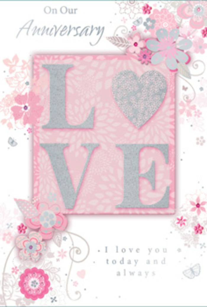 This anniversary card feels like stepping into a sunlit room near St James's, where love is quietly honoured every day. The central feature is the word LOVE, printed in an elegant, frosted glitter that lends a soft, shimmering texture. Each letter stands slightly proud from the card, catching the light as though dusted with fine crystal, much like the delicate sparkle on dewy petals in a morning bouquet prepared by Flower Delivery St James's. Encircling this motif, wispy, hand-drawn blooms drift along the borders and corners. Their petals and sprays are rendered in a gentle blend of blush pink, lilac, and creamy ivory, creating a harmonious pastel tapestry that feels as calm as an early stroll through St James's Park in spring. The flowers seem to float, their stems and leaves sketched with fine, looping lines that snake gracefully across the surface. Dainty leaves and filigree flourishes weave between the blossoms, and if you look closely, you notice almost-hidden butterflies tucked among the curves, their delicate wings suggested by tiny arcs and specks of light silver. This subtle detailing gives the card a sense of quiet movement, as though the design itself is breathing. The background is a soft, even pink wash, leaving space for the eye to rest while enhancing the warmth of the floral motif. Near the lower part of the card, the message I love you today and always is set in a graceful, understated typeface that mirrors the flowing lines of the artwork. It reads like a sincere promise, the kind a couple might exchange over an anniversary dinner near Piccadilly. As an image, the card evokes a hand-tied bouquet transformed into paper - tender, thoughtfully composed, and rich with affectionate sentiment.